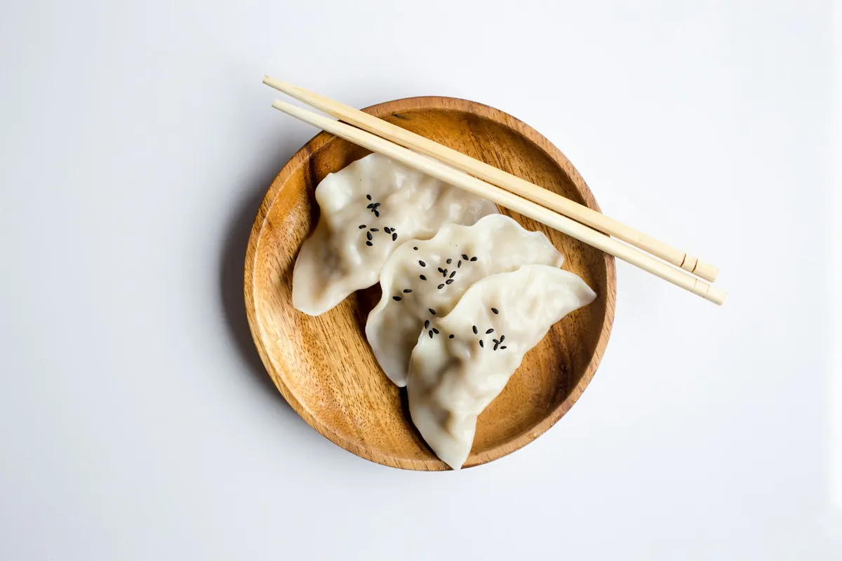 Dumplings served in a bamboo steamer
