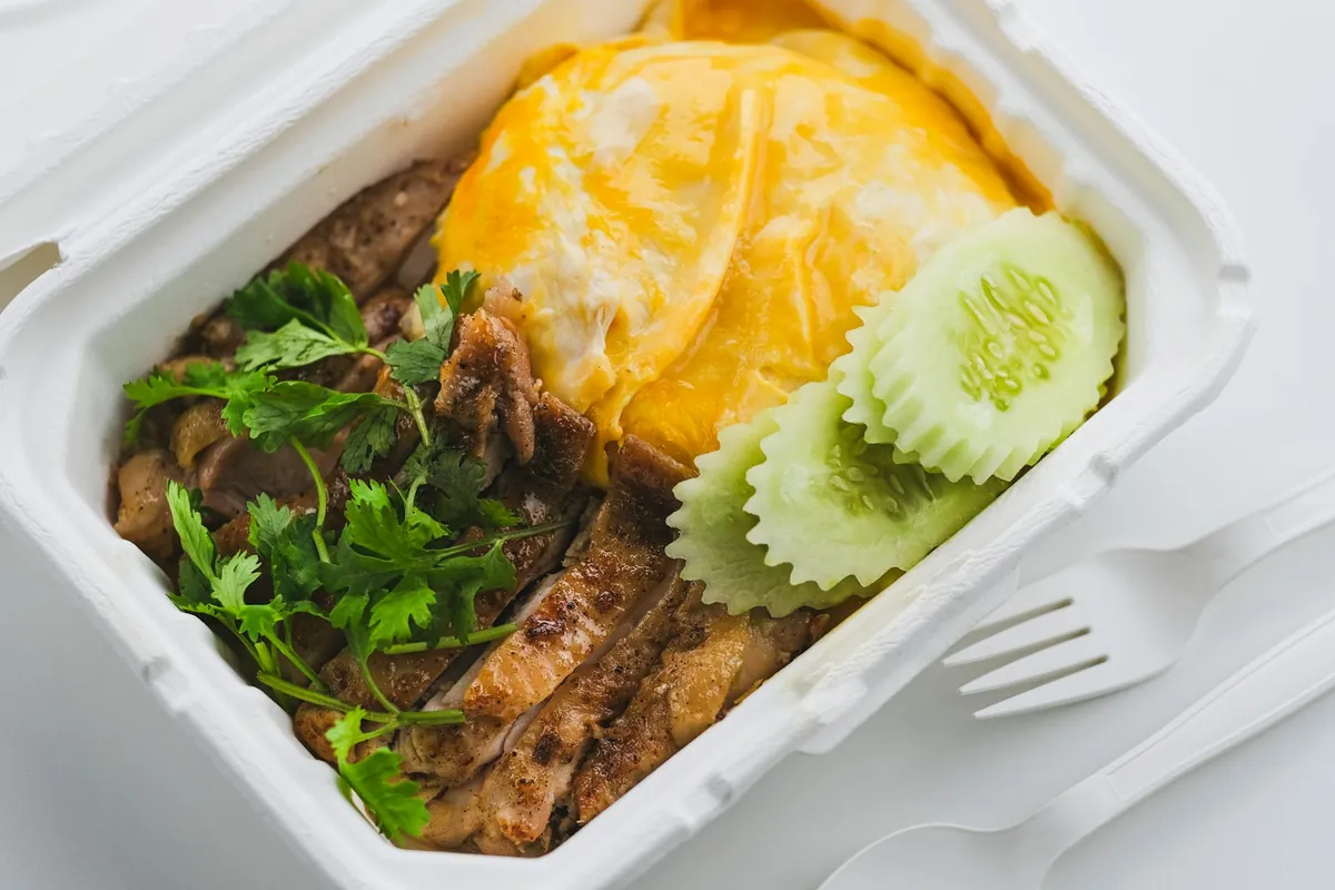 A container of steamed white rice