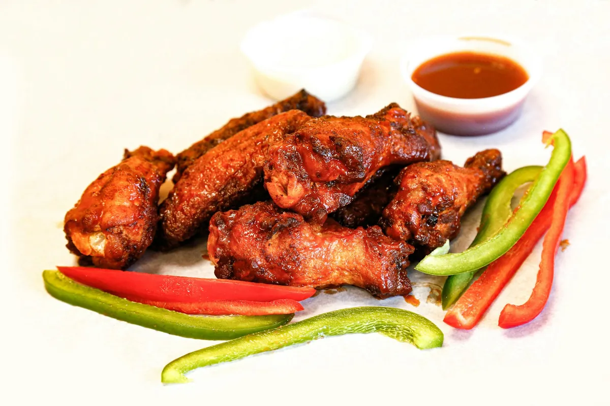 A plated portion of glazed fried chicken