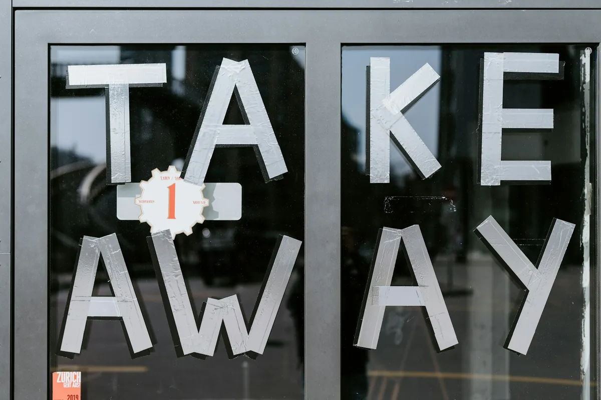 Completed orders waiting at a takeout counter
