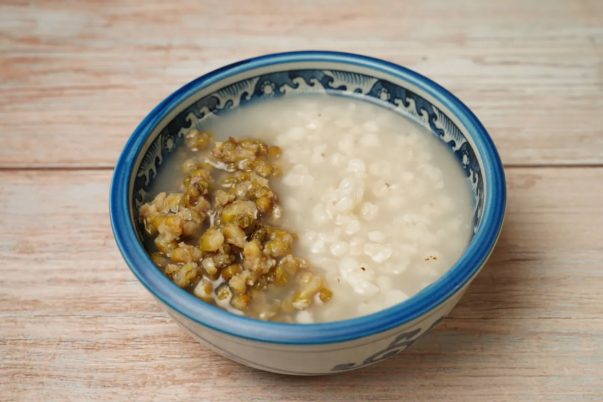 Thick savory rice porridge in a bowl