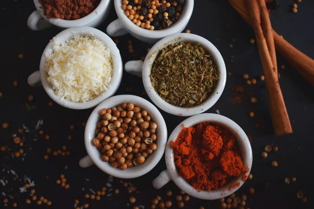 Cinnamon, cloves and fennel seed arranged together