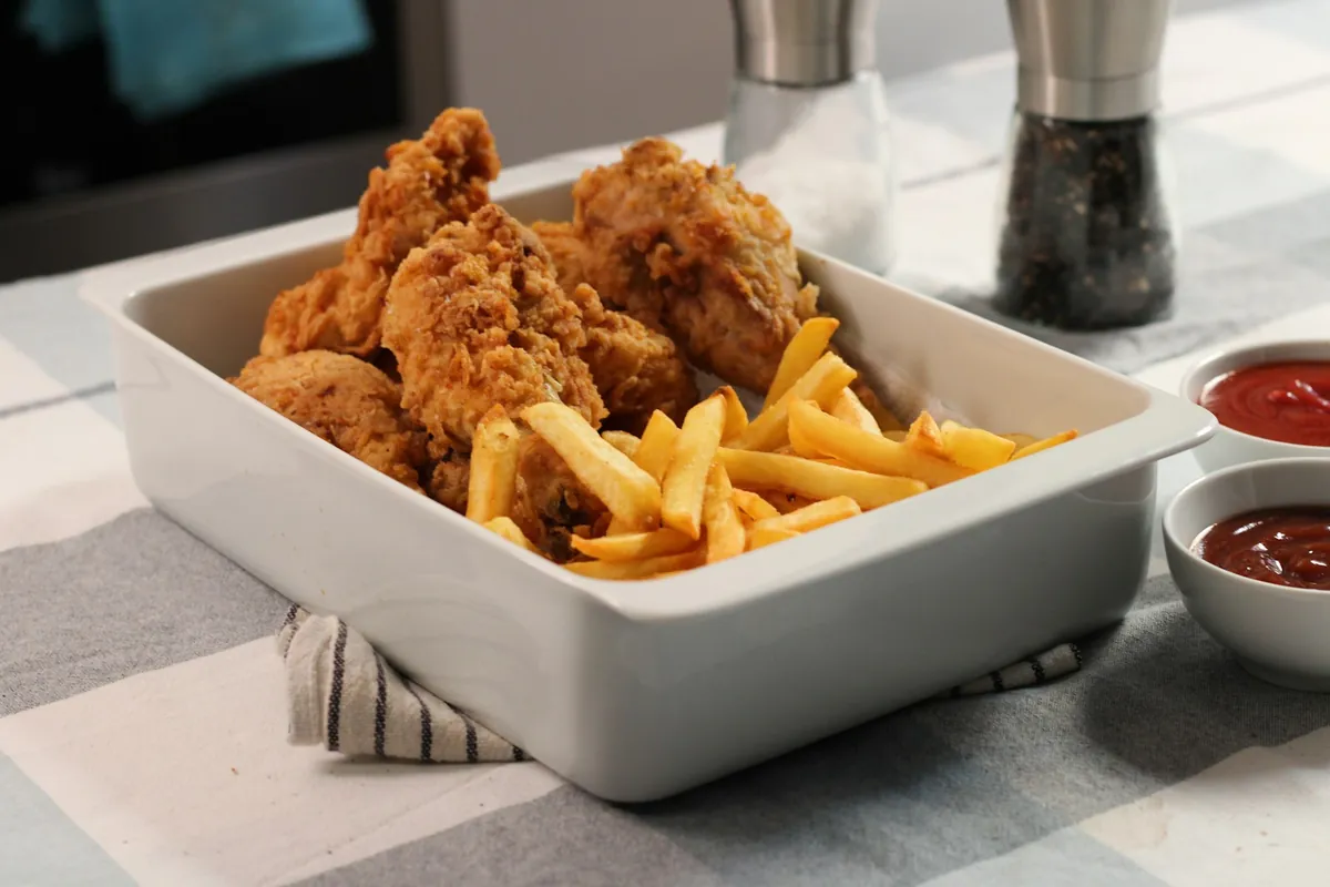 A close view of the crisp coating on a fried wing