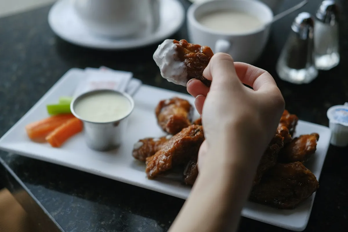 Fried chicken wings served in a basket