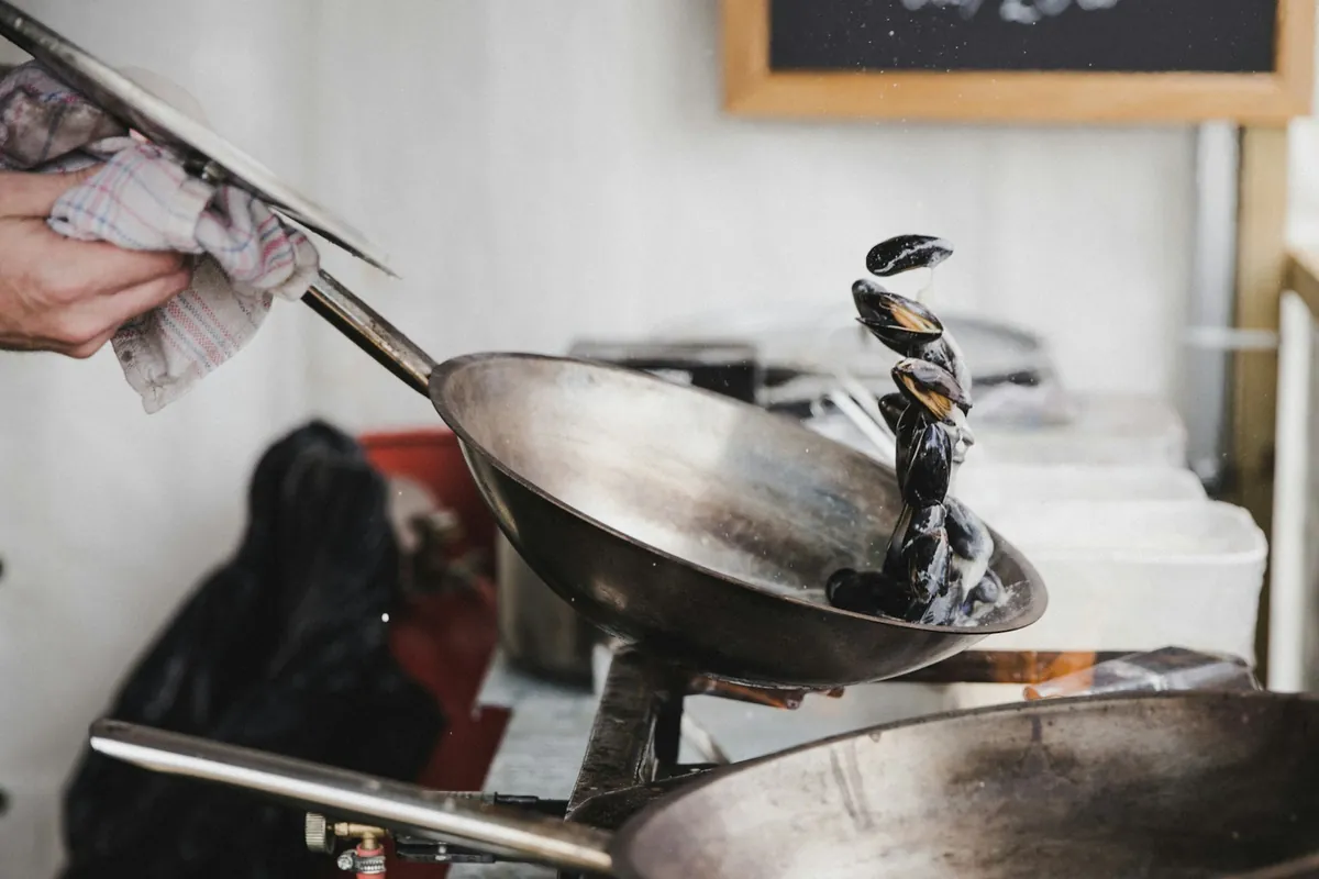 A single dish being cooked in a wok