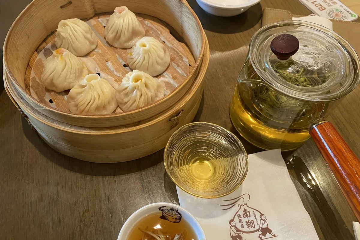Small filled parcels served in a savory broth